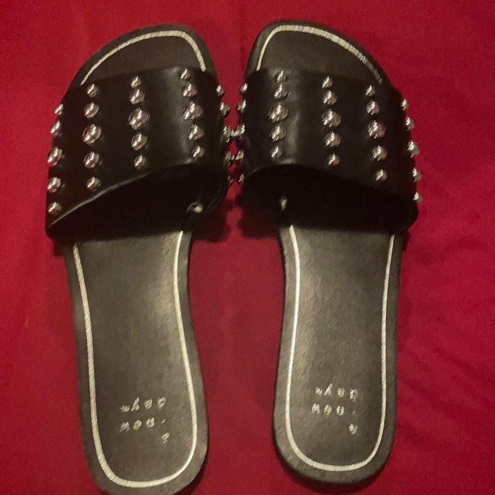 Black sandals.